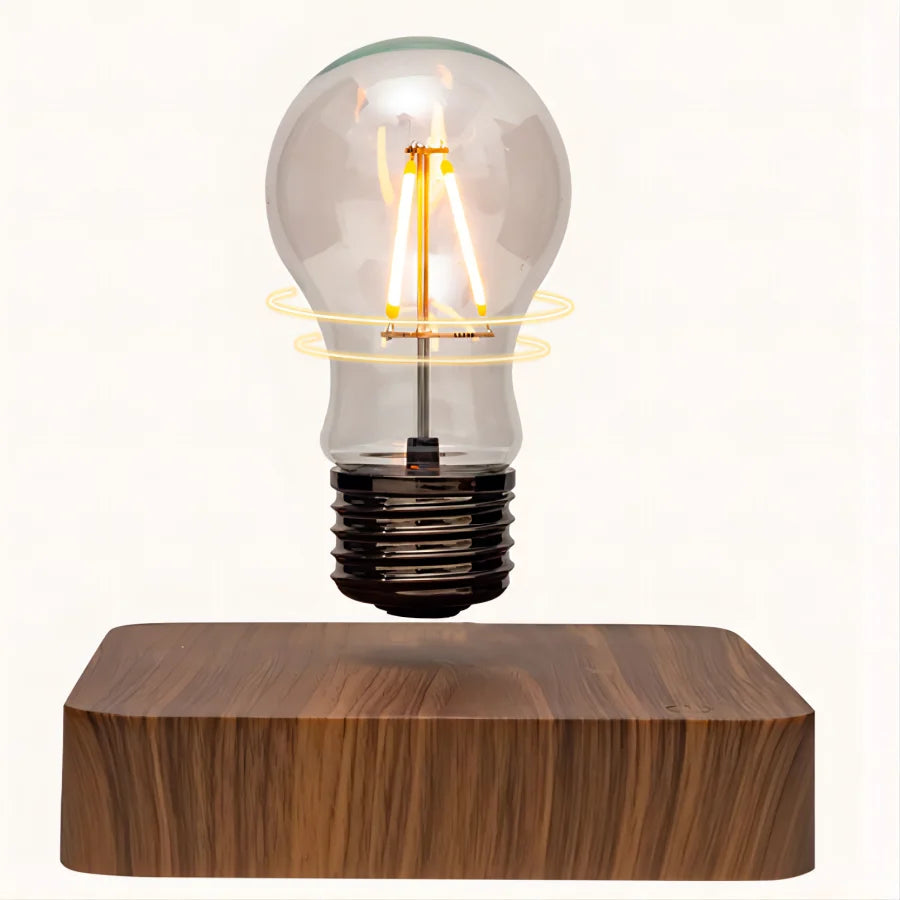 Light bulb on a square wooden base against a white background