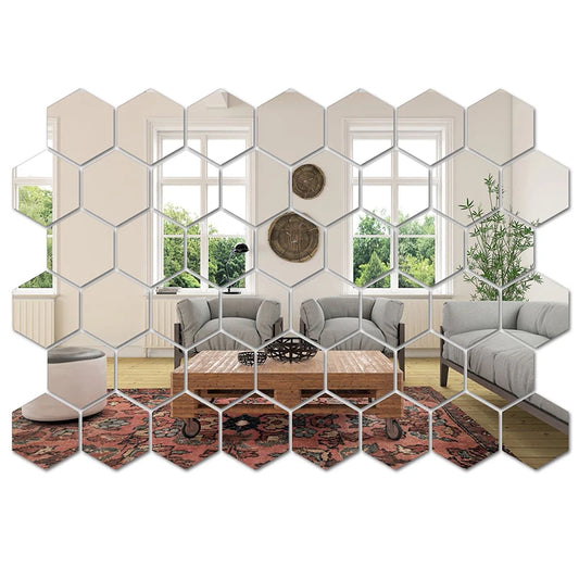 An arrangement of hexagon-shaped mirror wall stickers covering a wall in a living room setting, reflecting light and creating a geometric pattern.