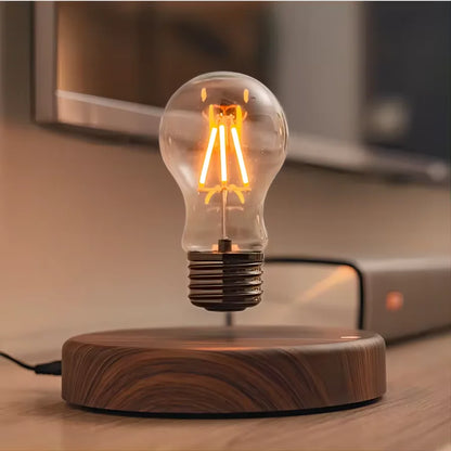 Light bulb levitating on a wooden base with a blurred background