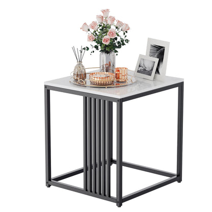 Small side table with decorative items on a white background