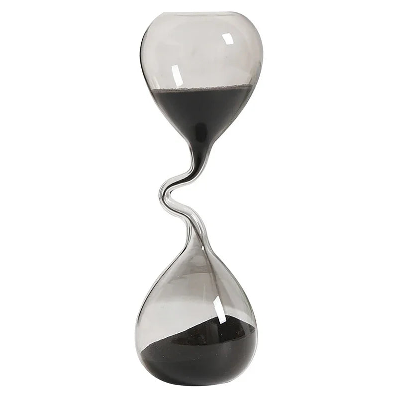 Hourglass with black sand on a white background