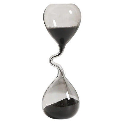 Hourglass with black sand on a white background